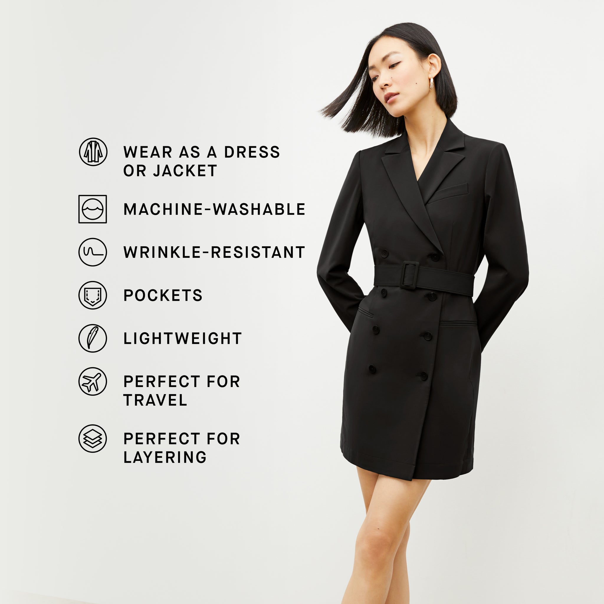 Front image of a woman wearing the gwynne dress in black with the product features listed