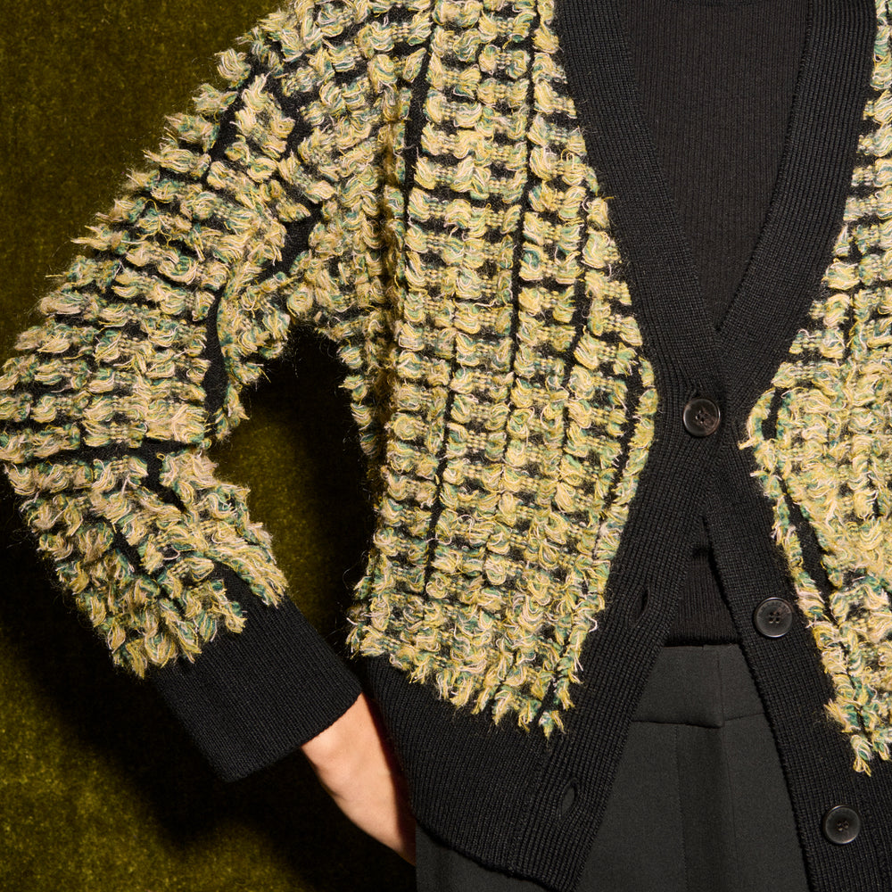 front image of the rayna sweater in pom pom knit