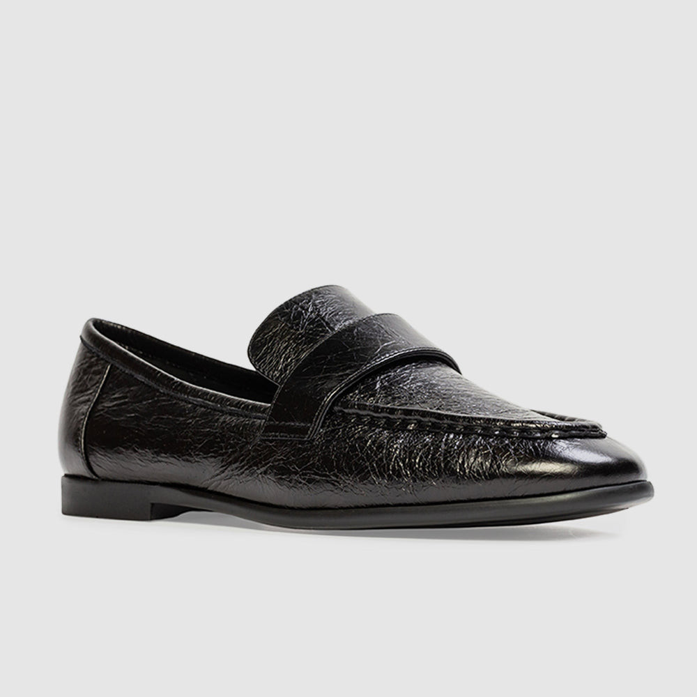 Black loafer on a white background