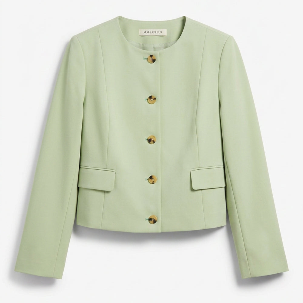 Light green blazer with gold buttons on a white background