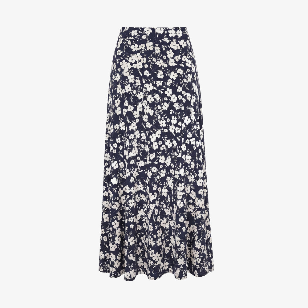 Packshot of a long skirt in black and white floral print