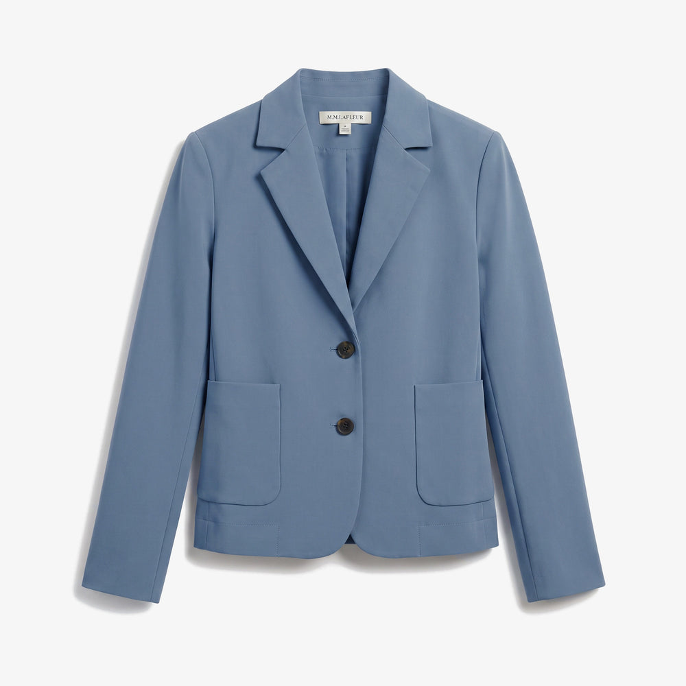 A slate blue tailored blazer with notch lapels, two front buttons, and two front patch pockets, shown flat against a white background.