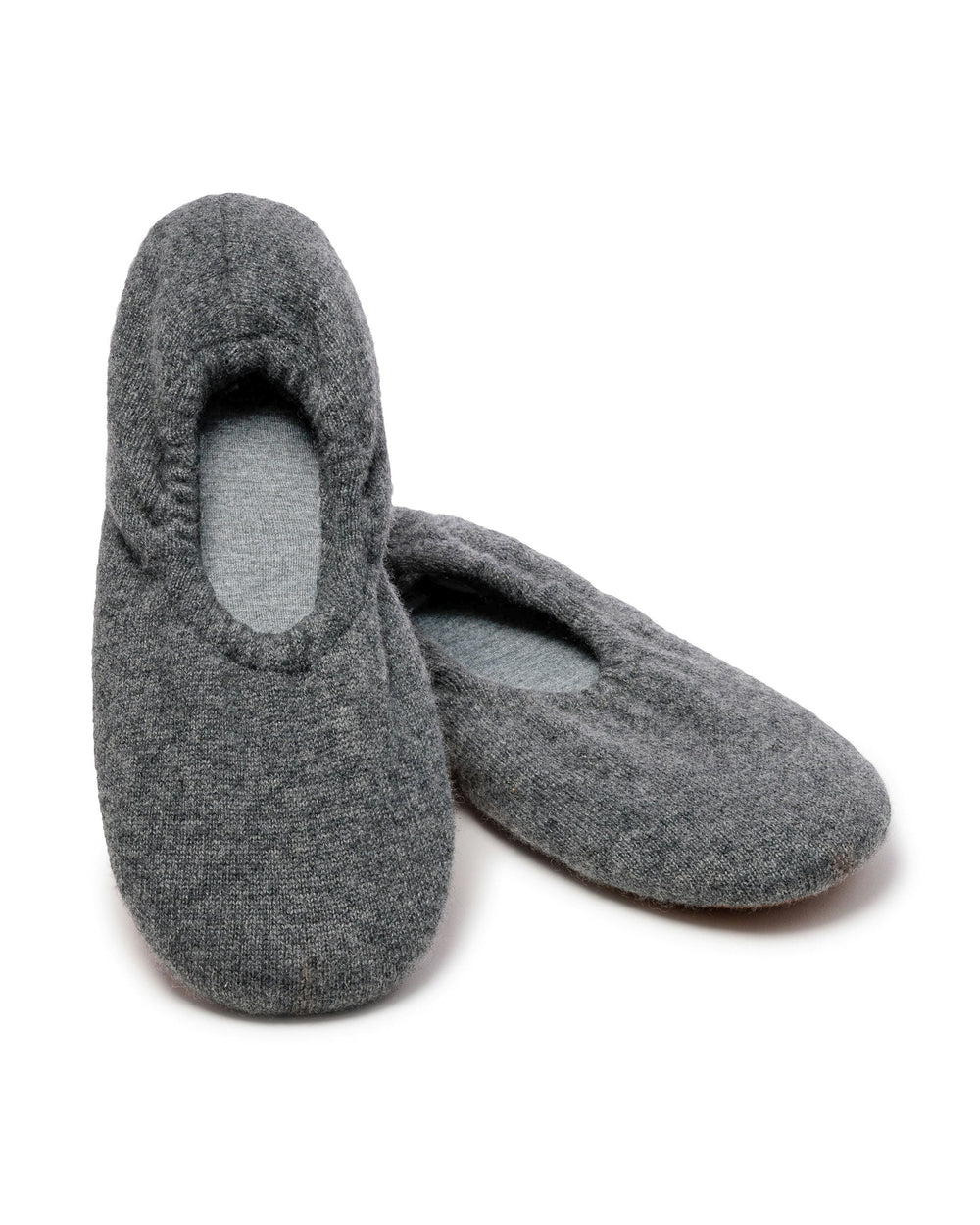 Pair of gray slippers on a white background