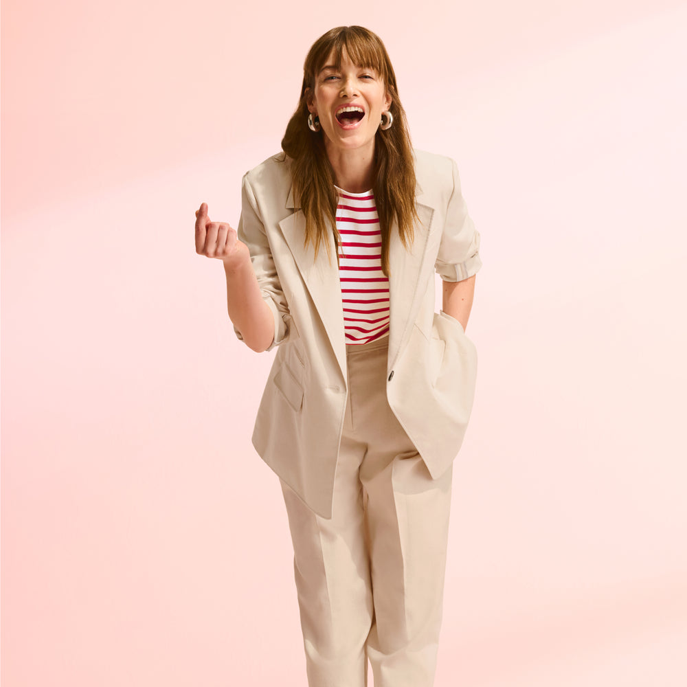 front image of a woman wearing the arlo pant and teddy jacket in natural