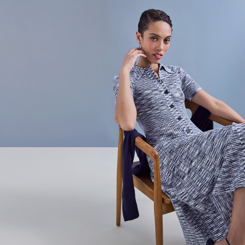 Woman wearing a blue patterned dress