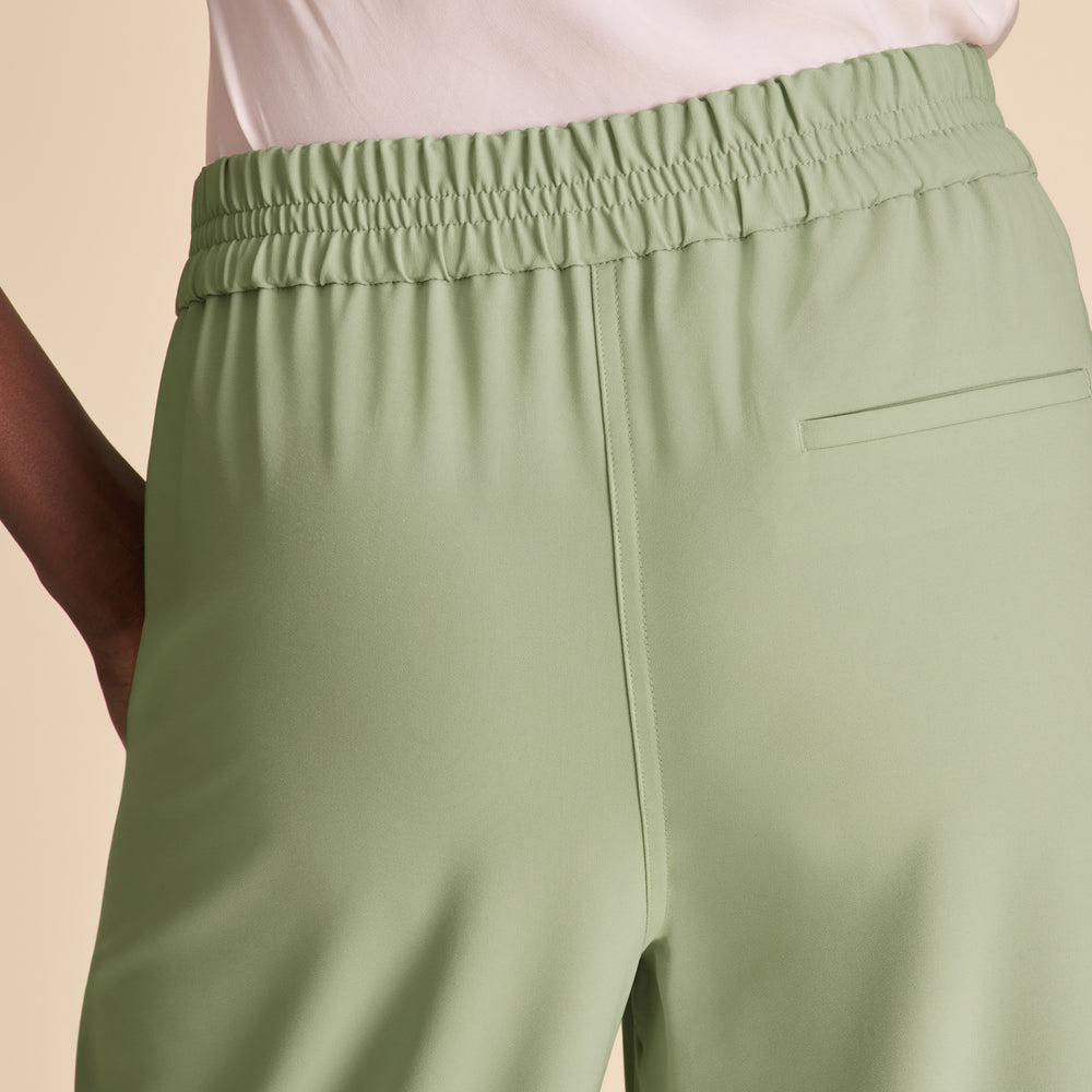 Green pants with a plain background