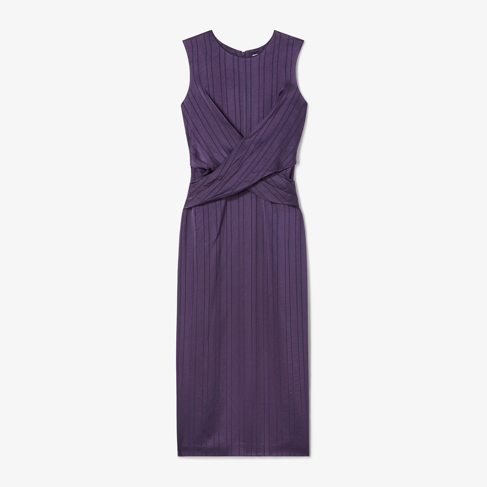 Purple dress with a criss-cross detail on a white background