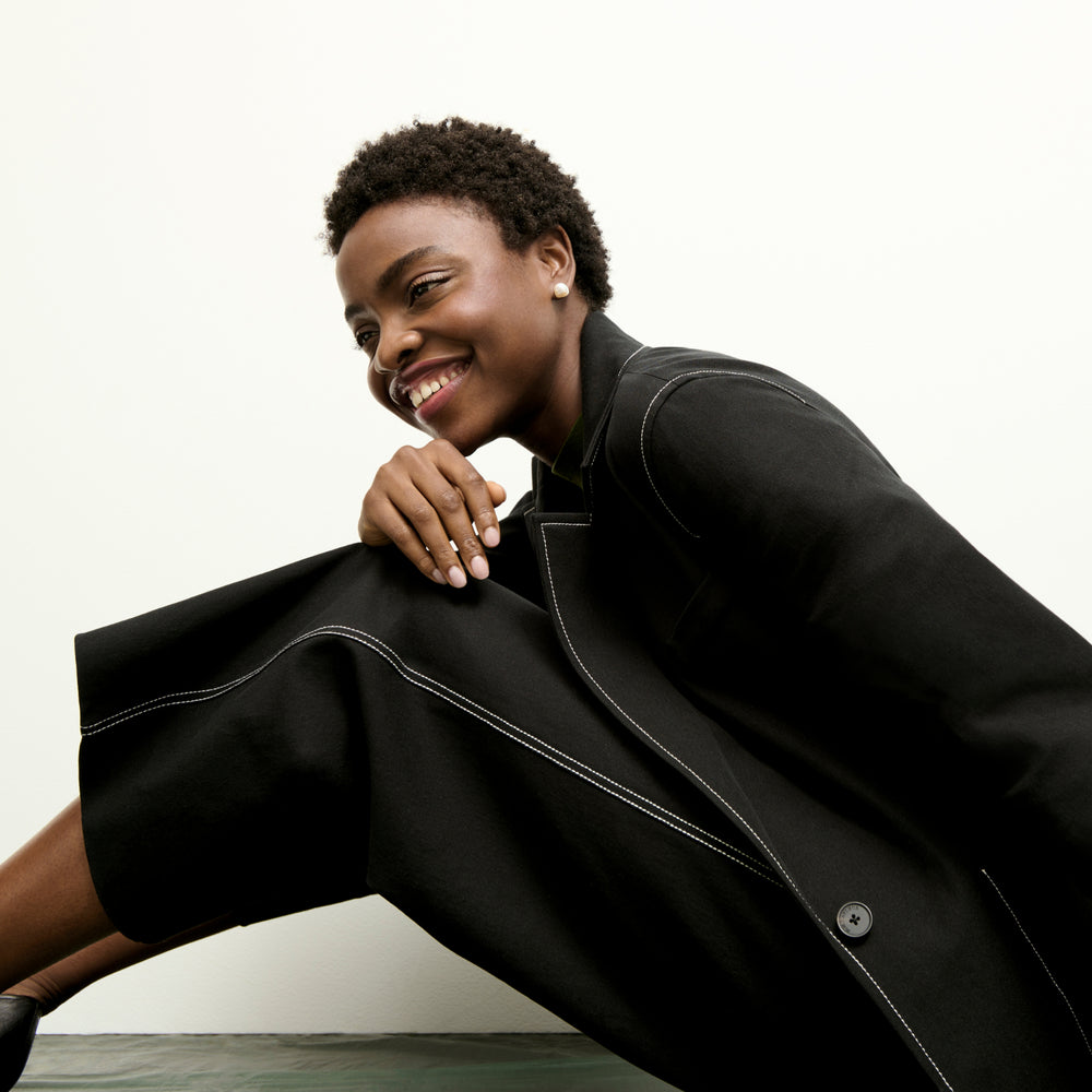 side image of a woman wearing the abby pant in black