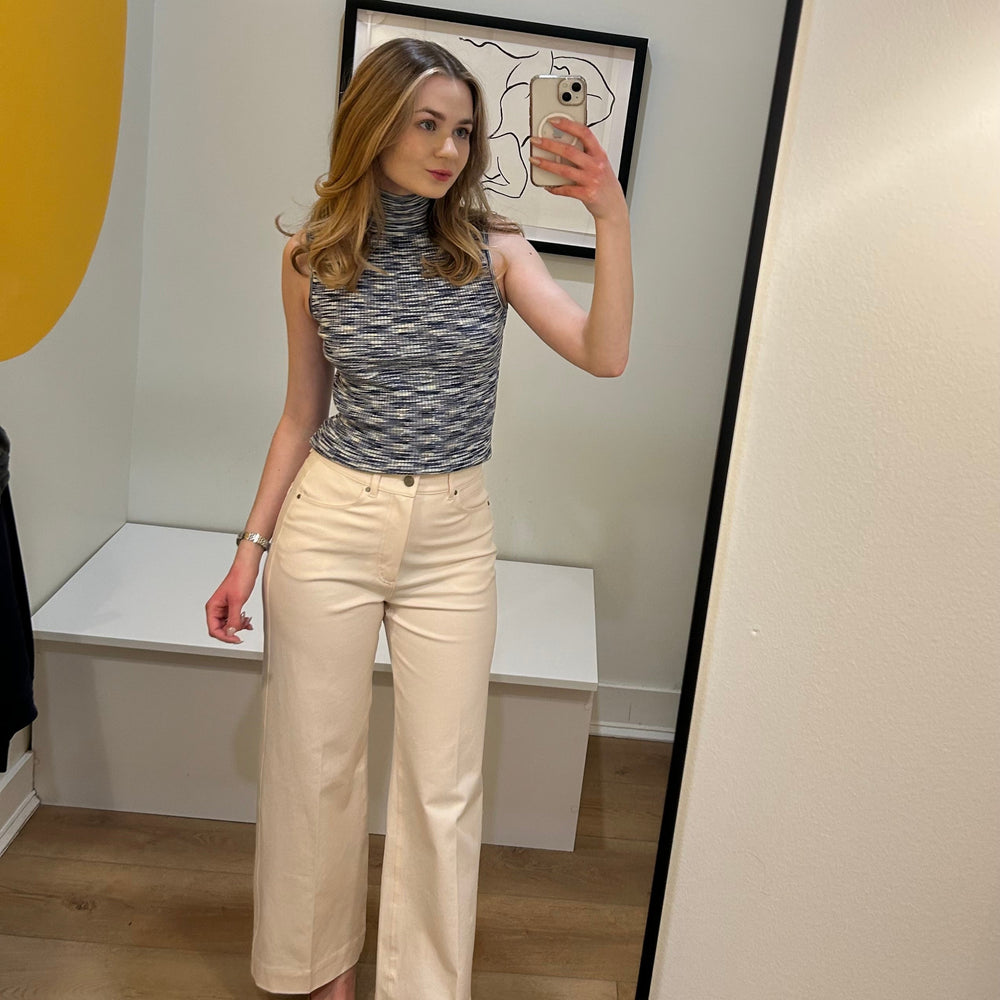 image of a woman wearing the koa turtleneck