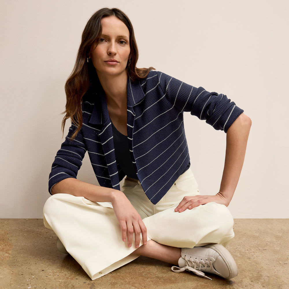 front image of a woman wearing the jolie jardigan in dot knit