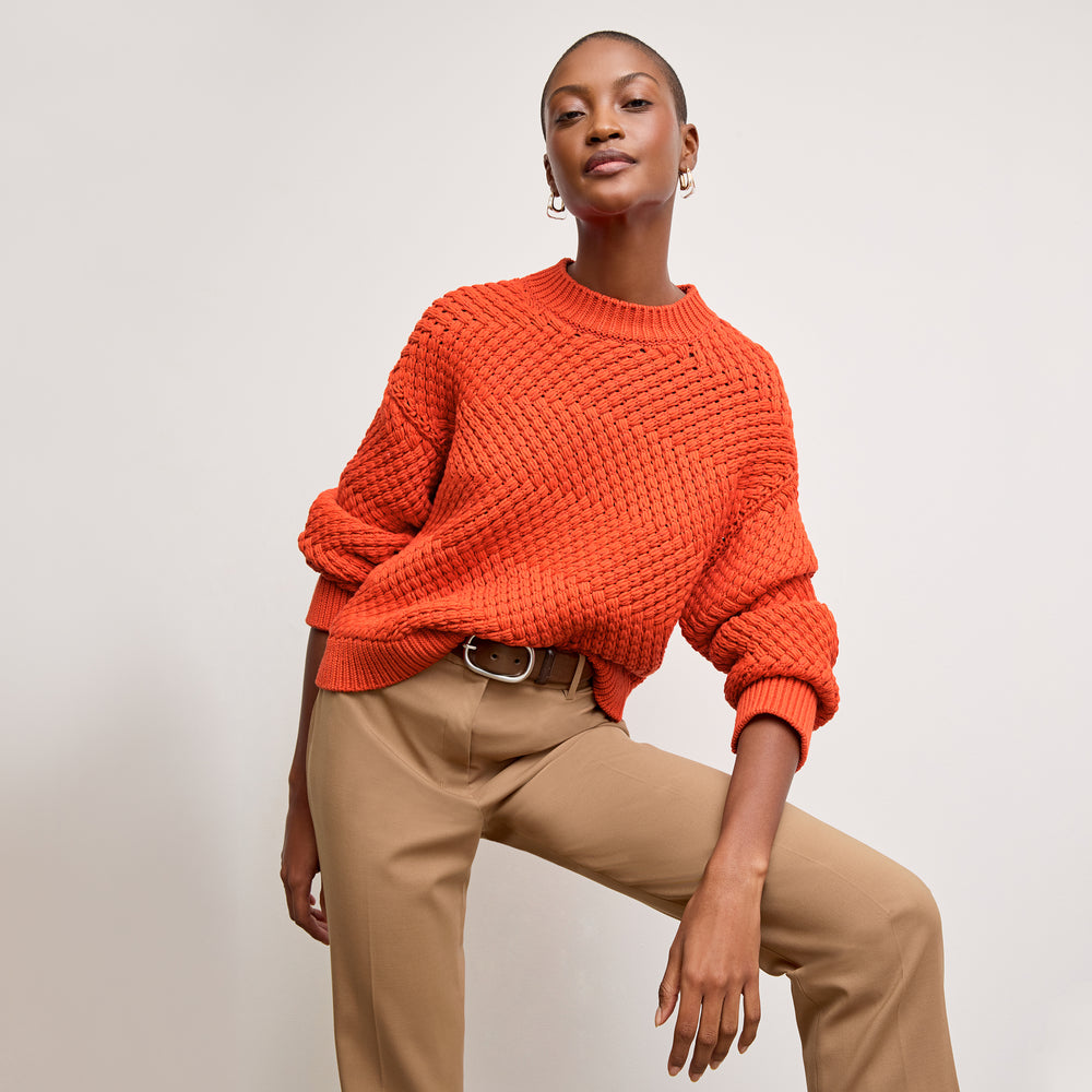 front image of a woman wearing the kiki sweater in valencia