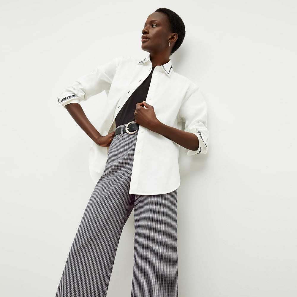 front image of a woman wearing the milo pant in gingham linen