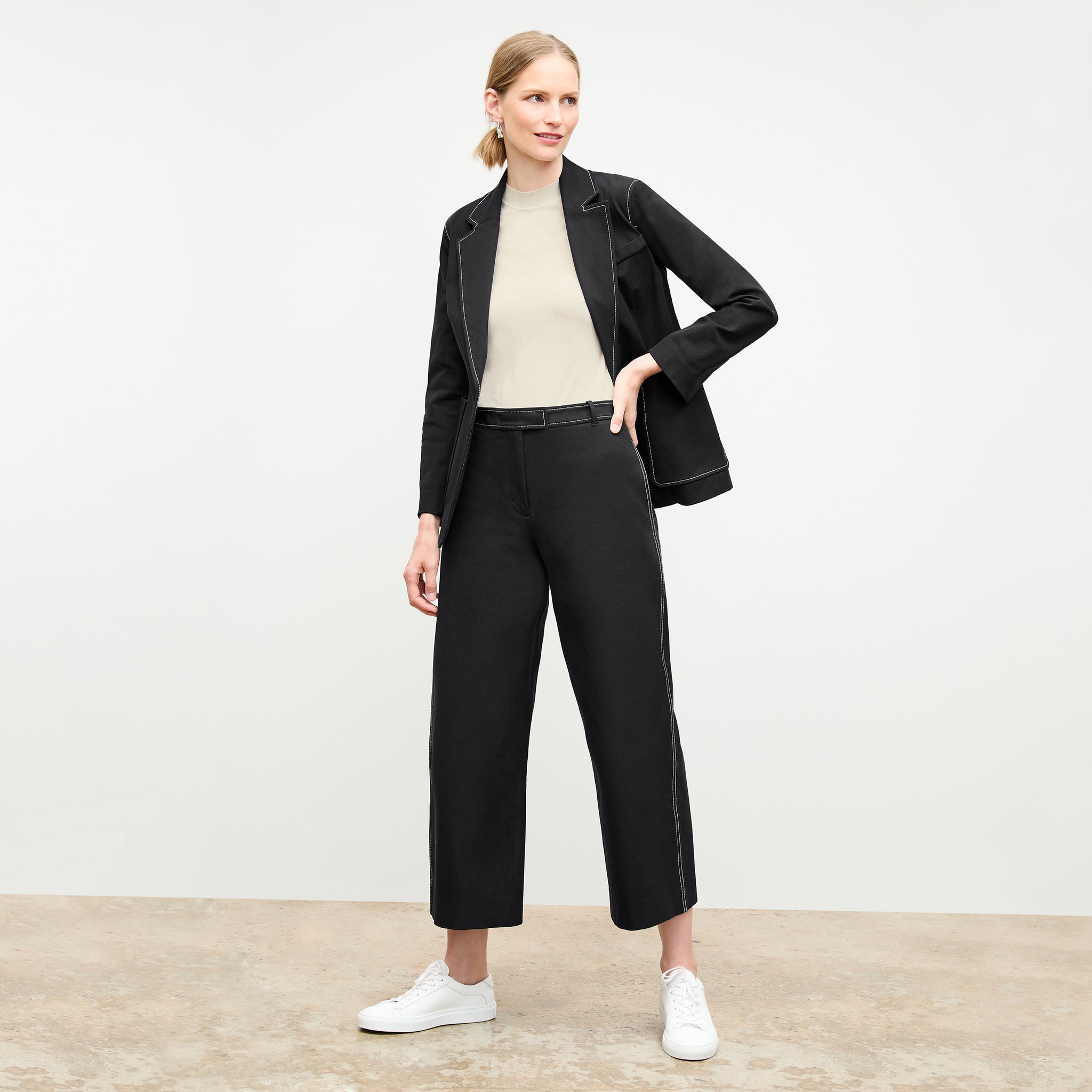 front image of a woman wearing the abby pant in black