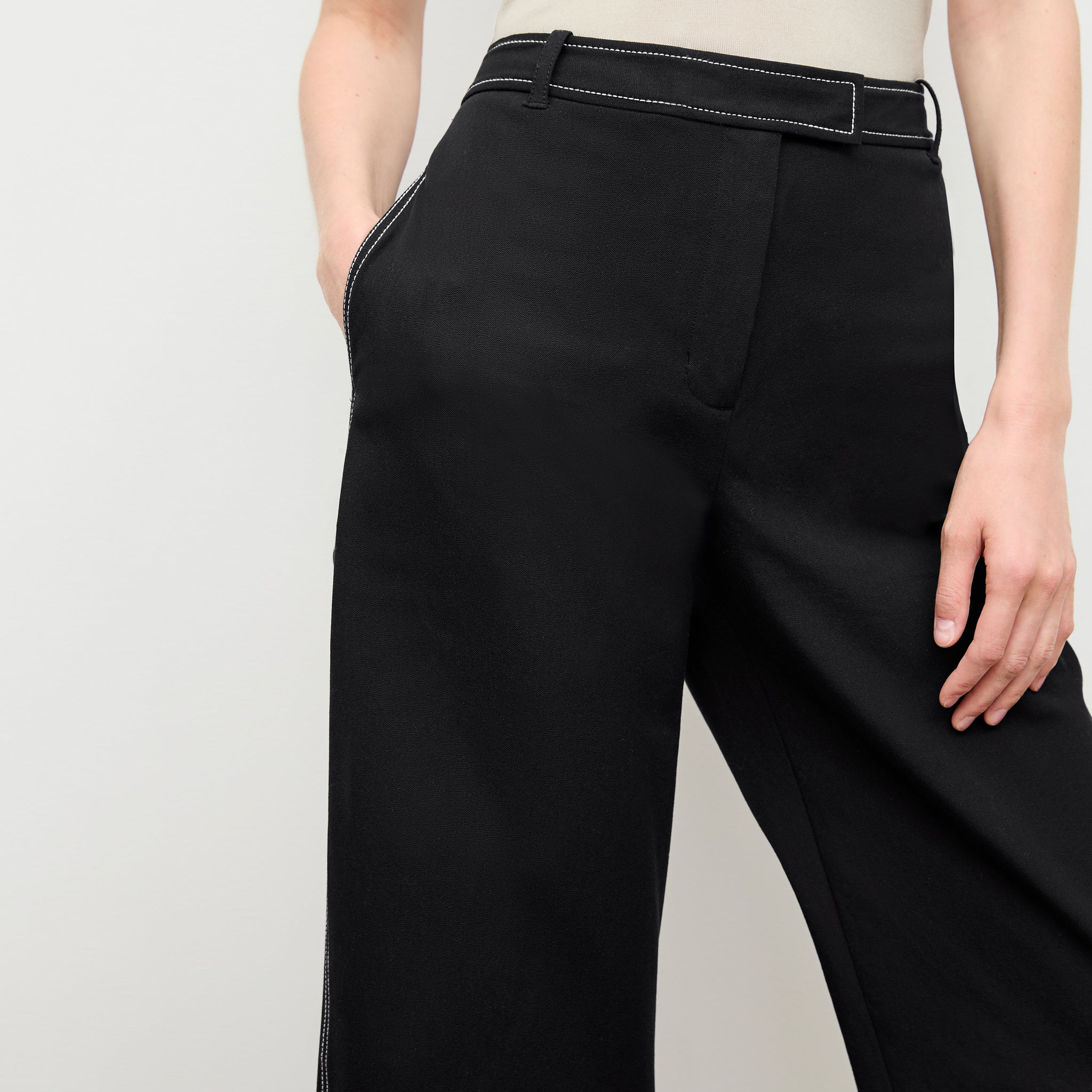 detail image of a woman wearing the abby pant in black