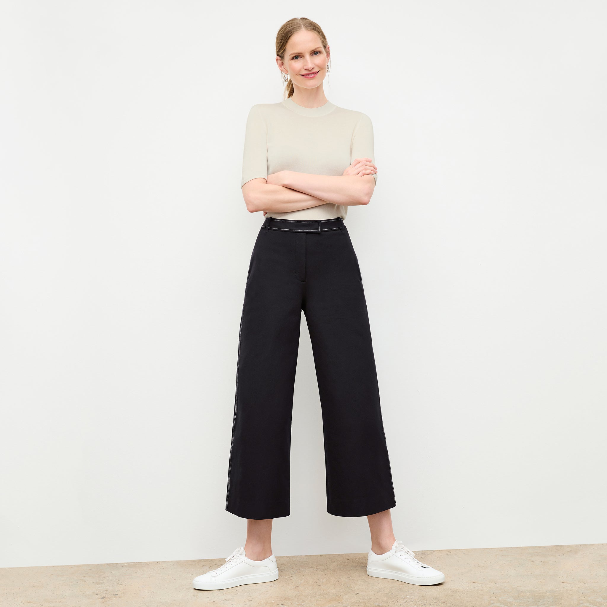 front image of a woman wearing the abby pant in black; workwear, machine washable pant 