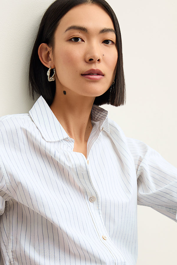 Front image of a woman wearing the Mila Button Down - Poplin Stripe in Blue / Ivory