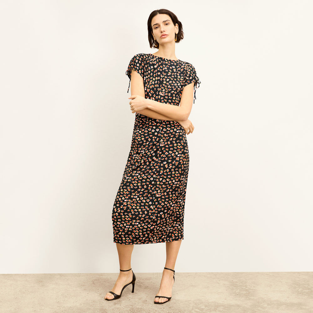 front image of a woman wearing the aisling dress in kaleidoscope print
