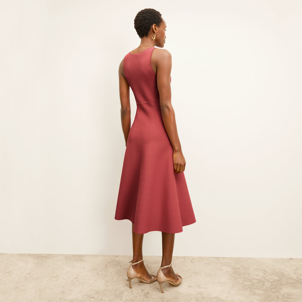 back image of a woman wearing the lottie dress in carnation