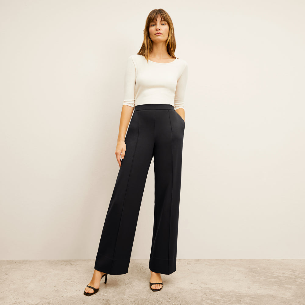 Front image of a woman wearing the Soyoung top in Ivory