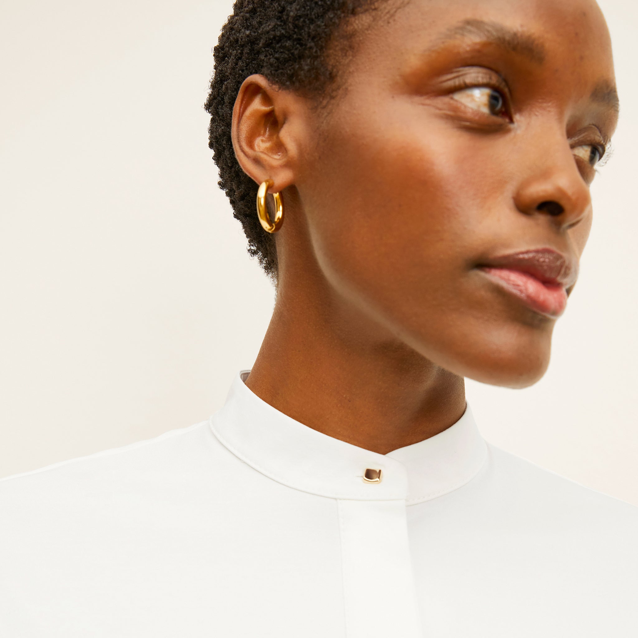 detail image of a woman wearing the tonya top in white