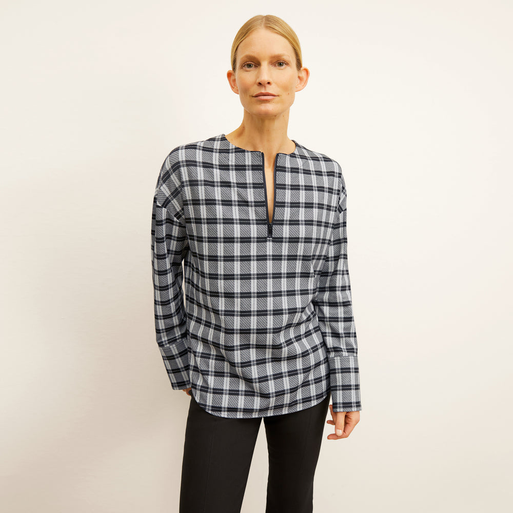front image of a woman wearing the tully top in checkmate