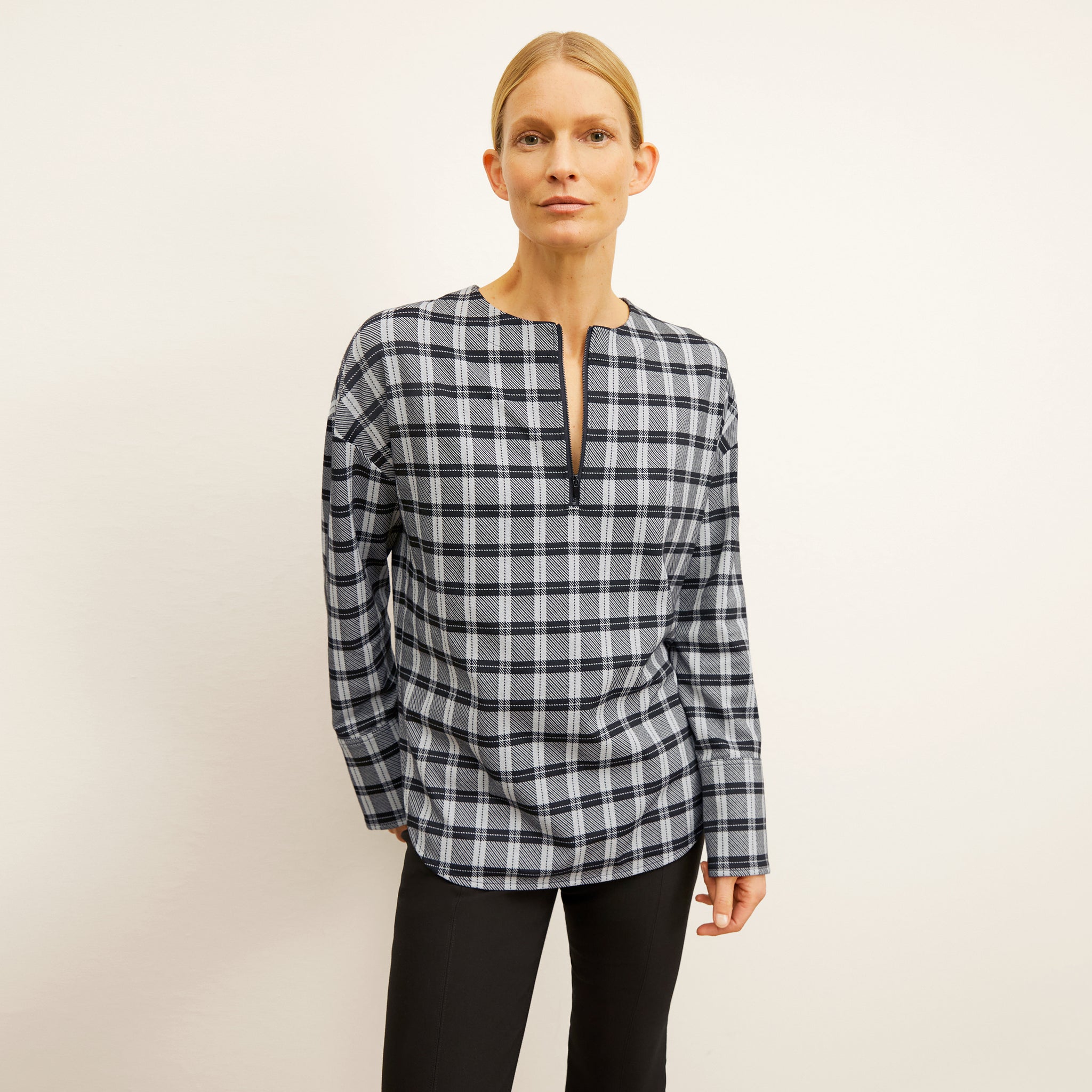 front image of a woman wearing the tully top in checkmate 
