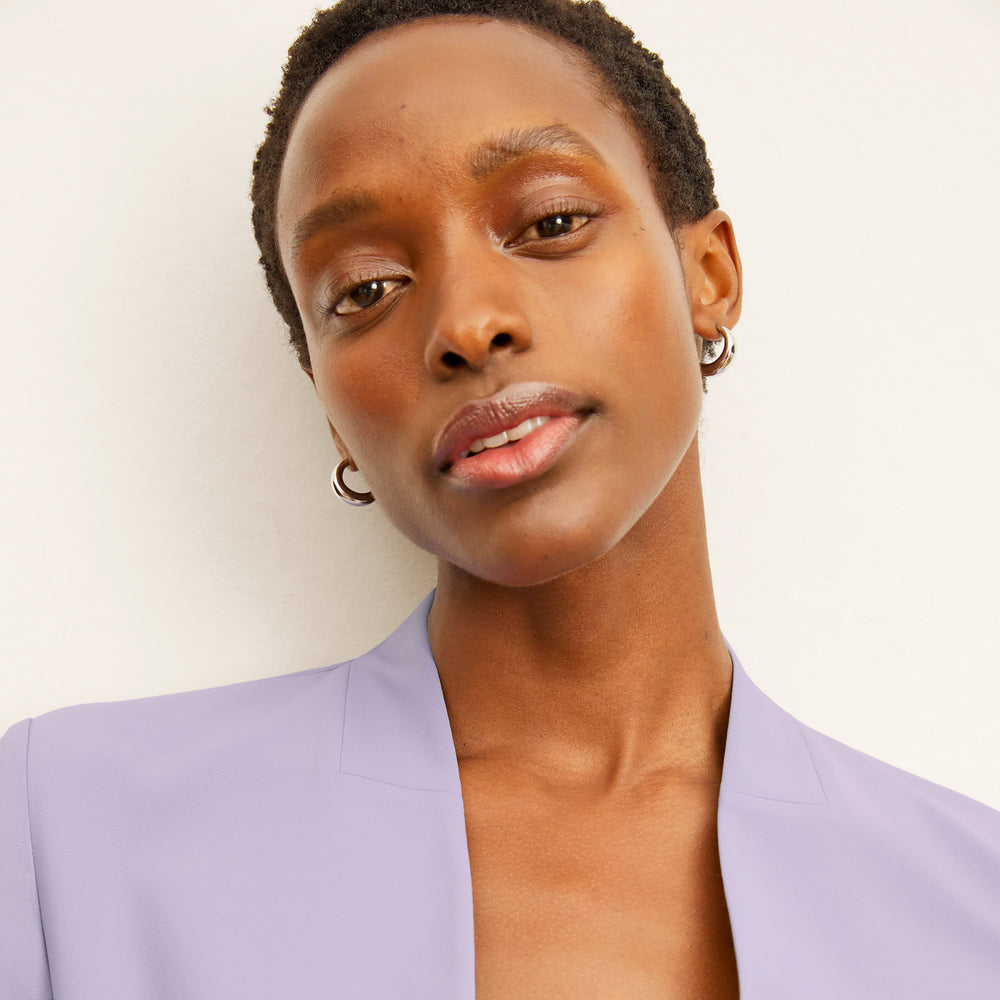 Front image of a woman wearing the Twidwell Blazer
