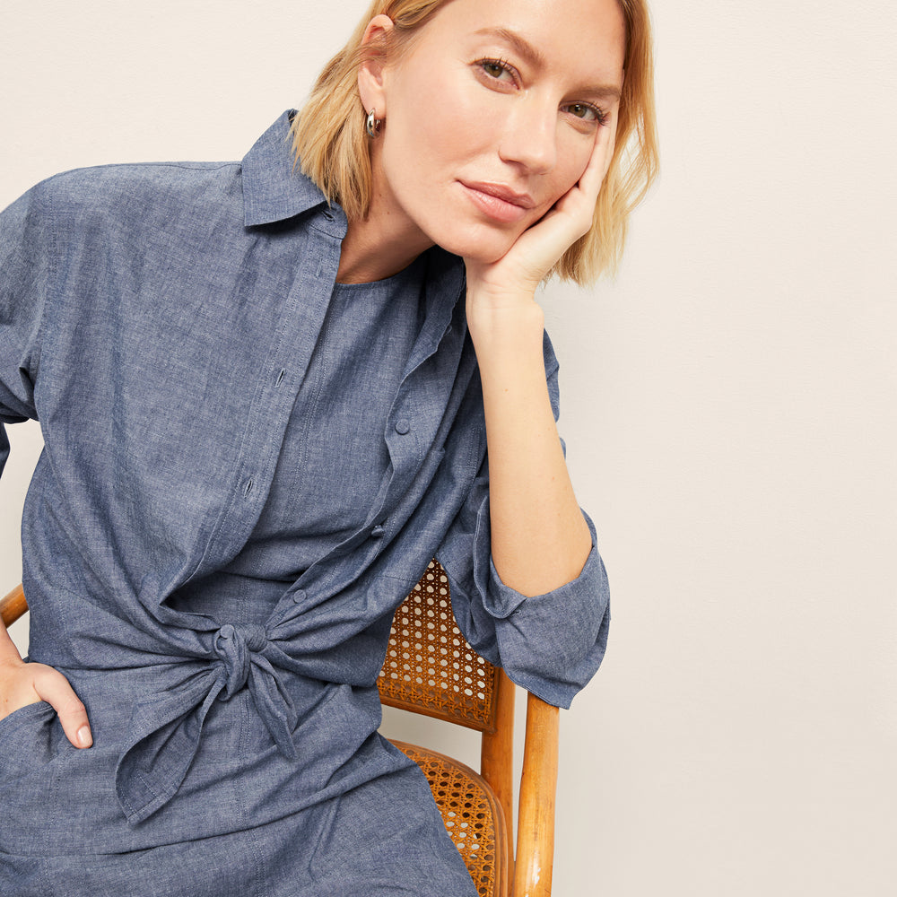 front image of a woman wearing the siobhan top in clear blue