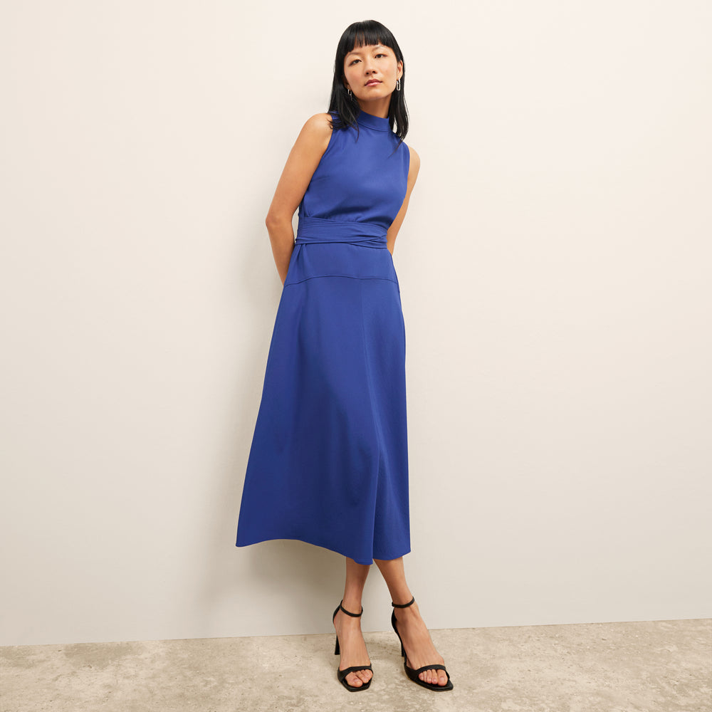 front image of a woman wearing the martina dress in royal blue