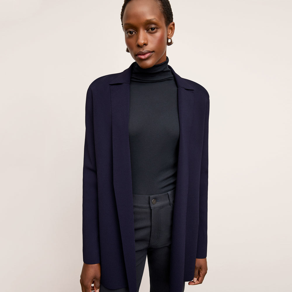 Front image of a woman wearing the Merritt Jardigan in Navy