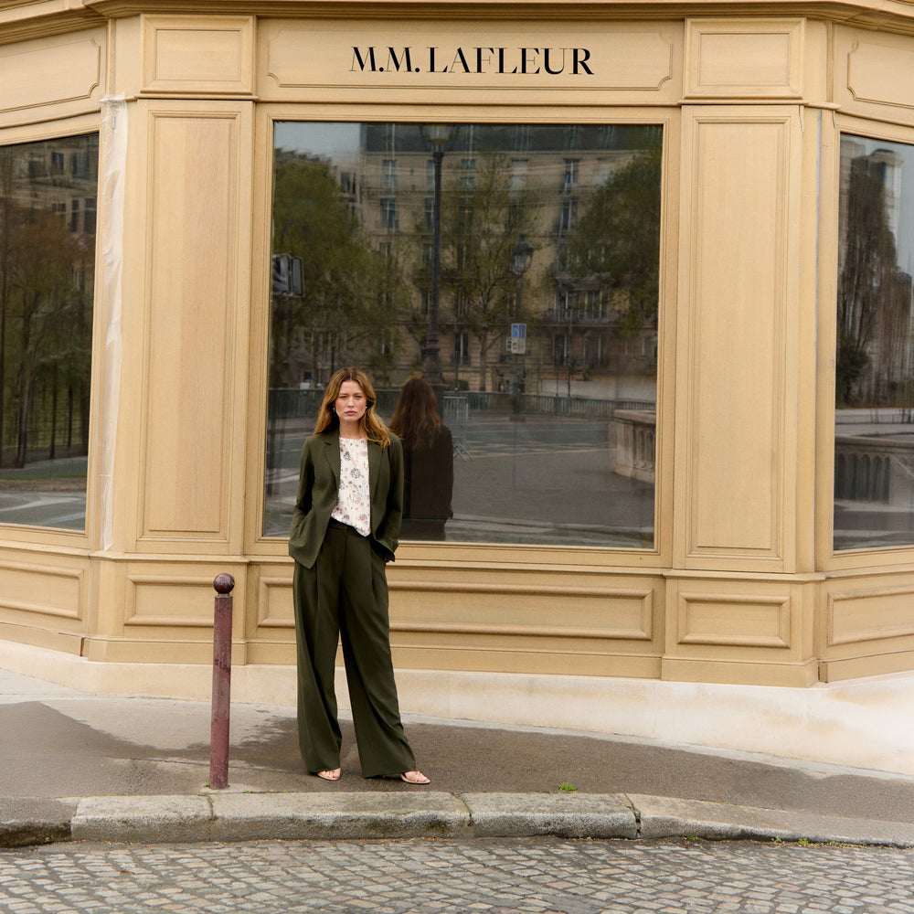 woman in green suiting.
