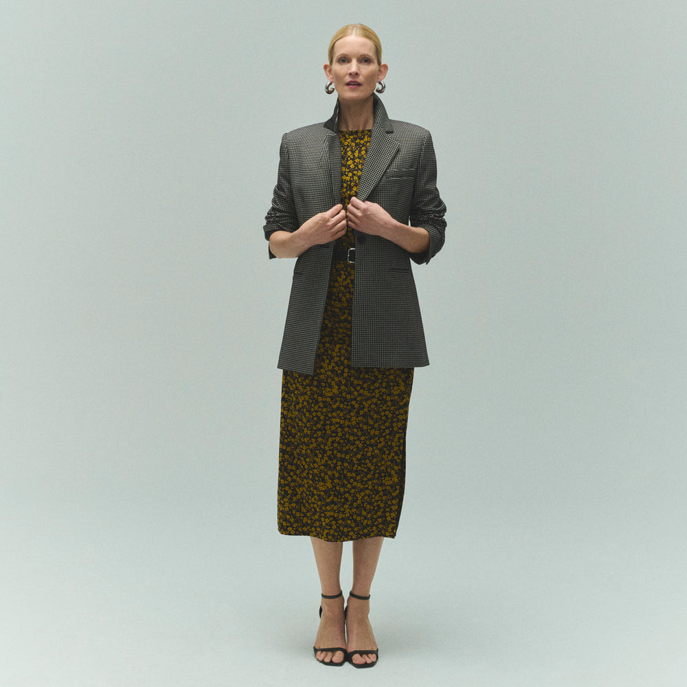 front image of a woman wearing the rossi blazer in classic check