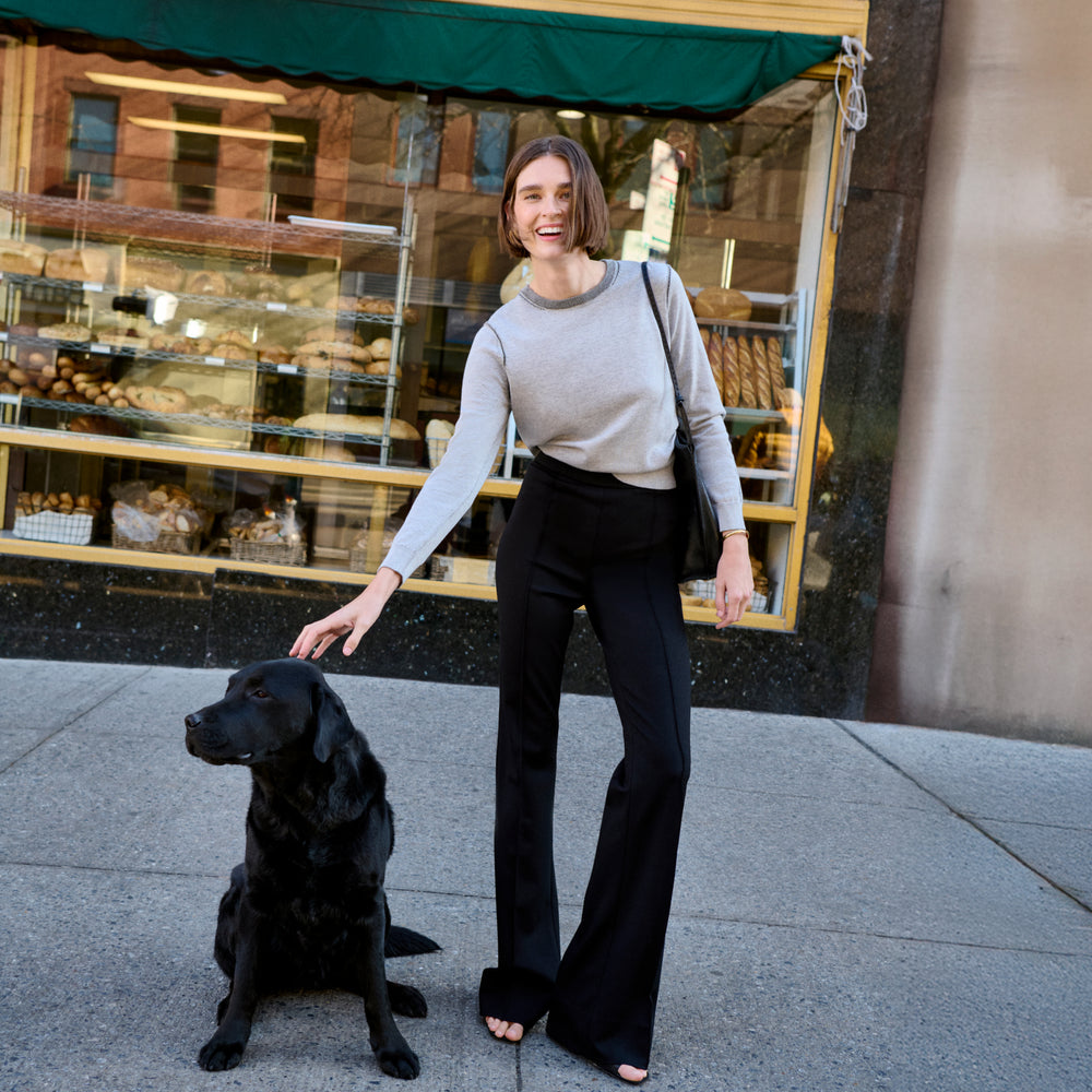 Front image of a woman wearing the hart pant in black