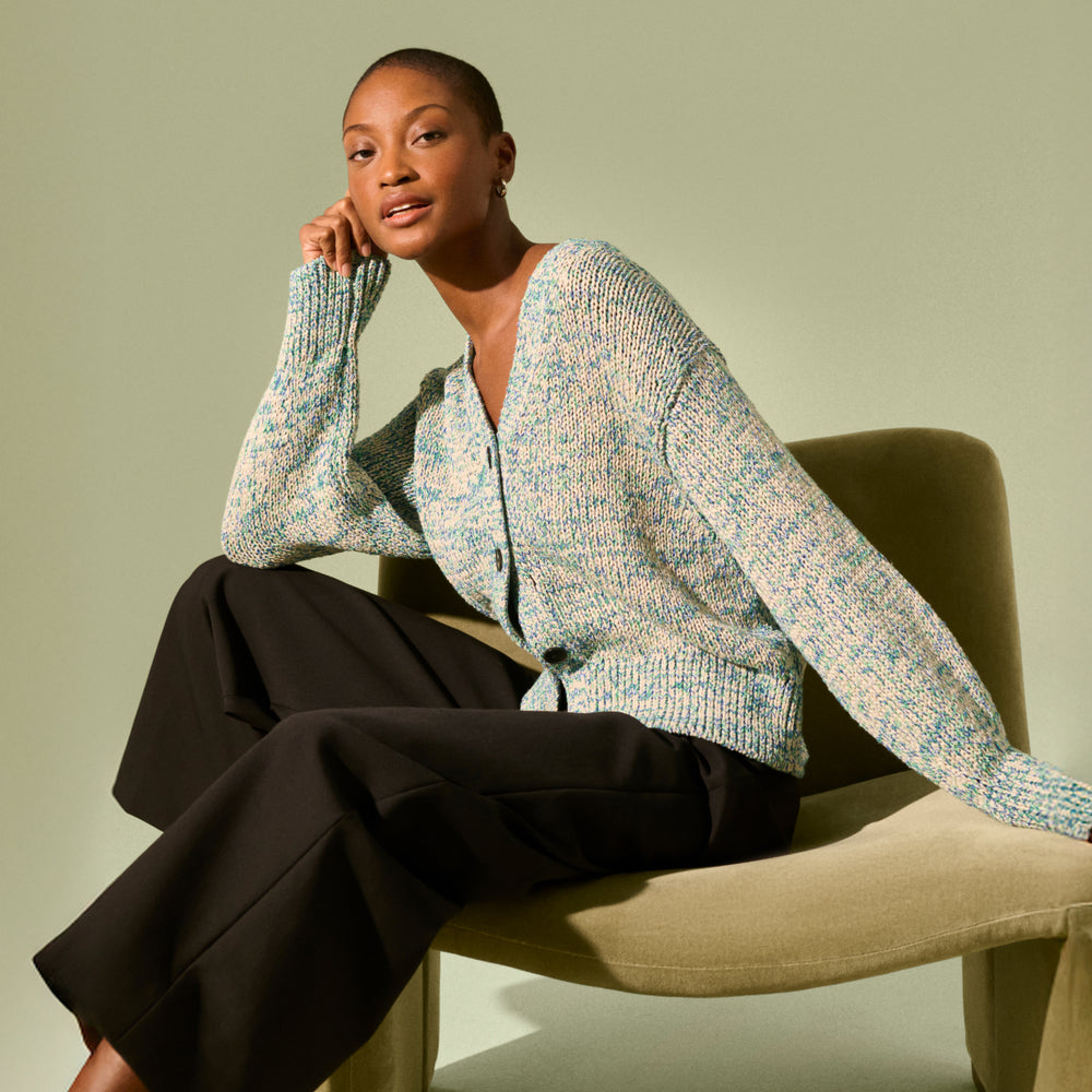 front image of a woman wearing the dakota sweater in multi