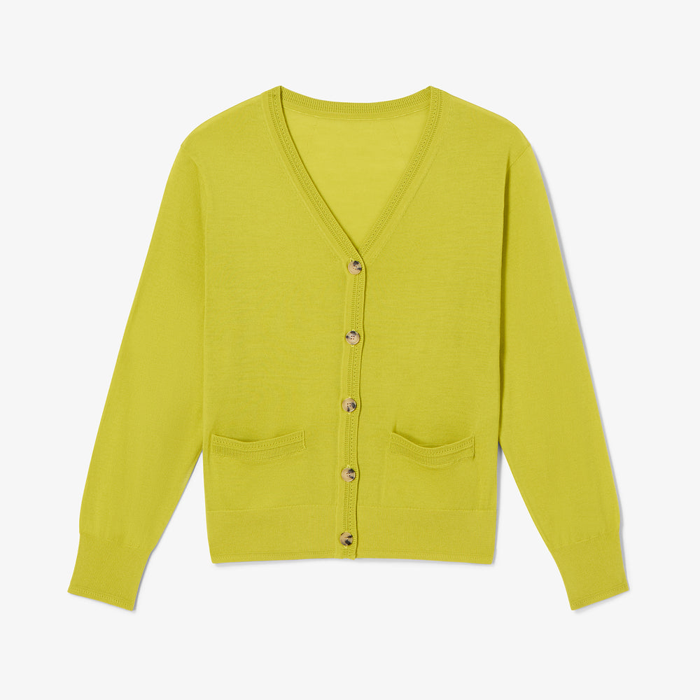 Yellow cardigan with buttons on a white background