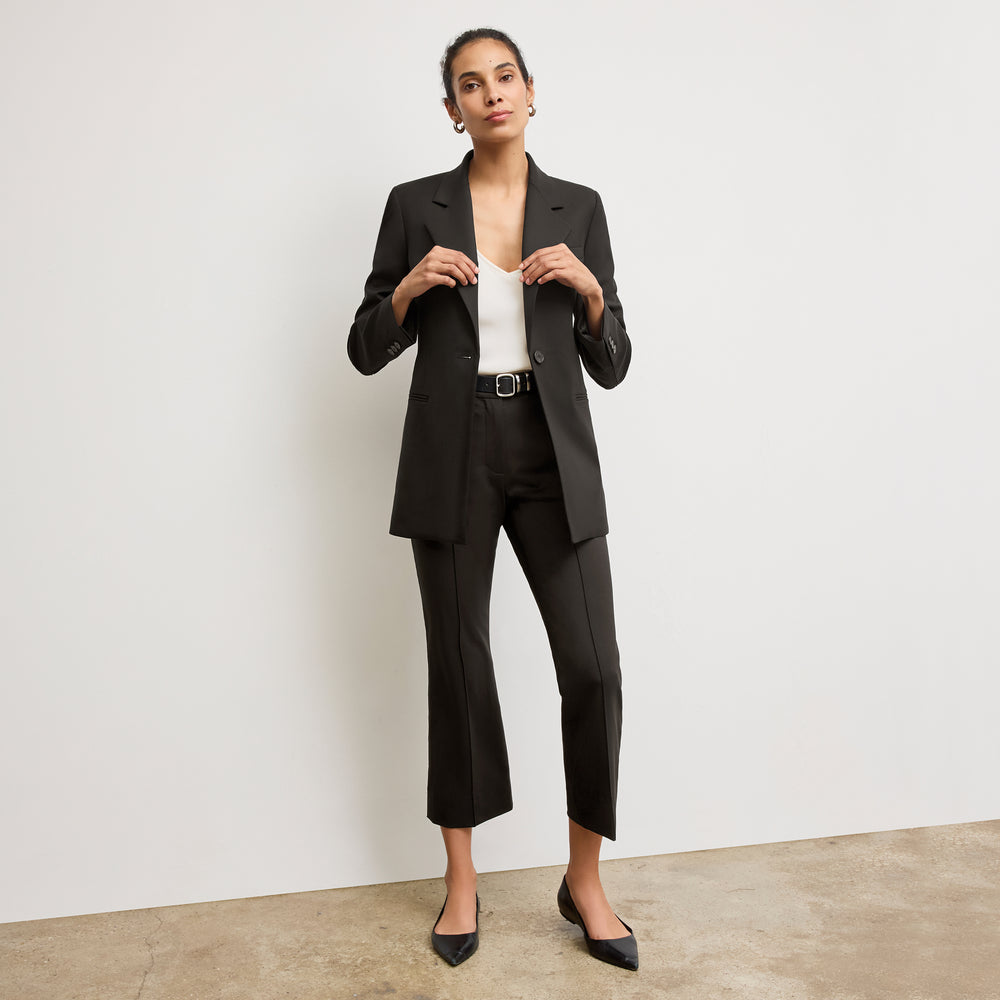 front image of a woman wearing the rossi blazer in black