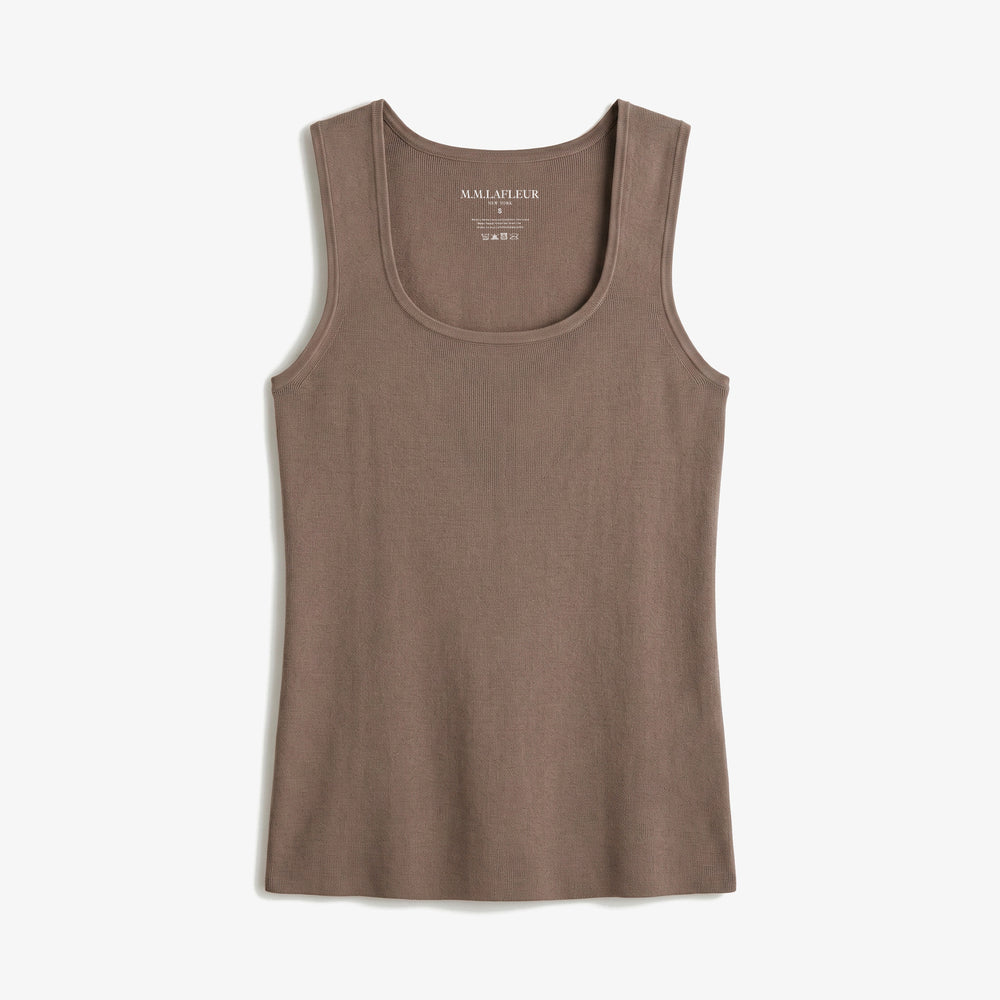 A sleeveless scoop-neck tank top in a muted taupe-brown color, shown flat against a light off-white background. The brand name 'MMLAFLEUR' is printed in white on the inside neck label.