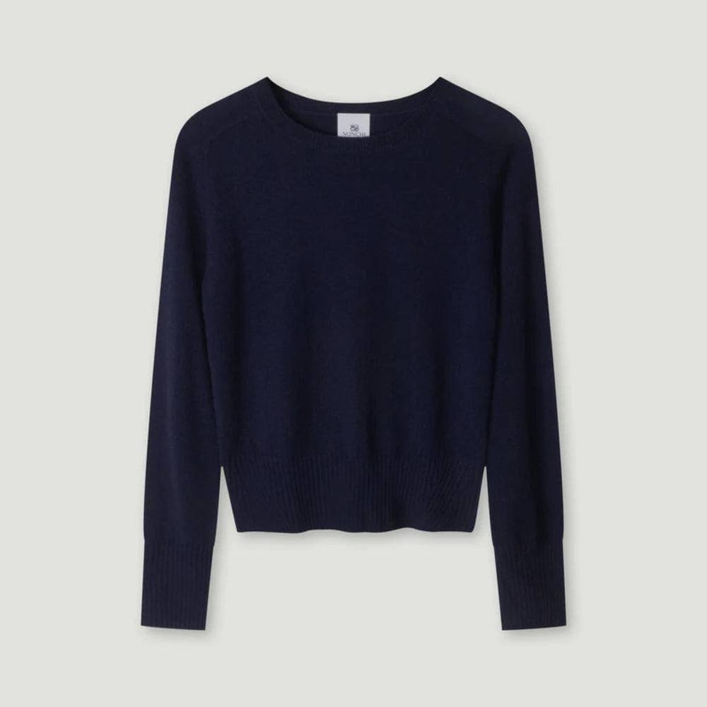 Navy blue sweater on a light gray background