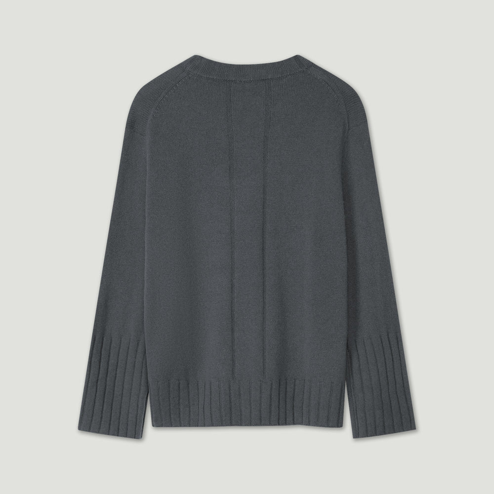 Dark gray sweater on a light gray background