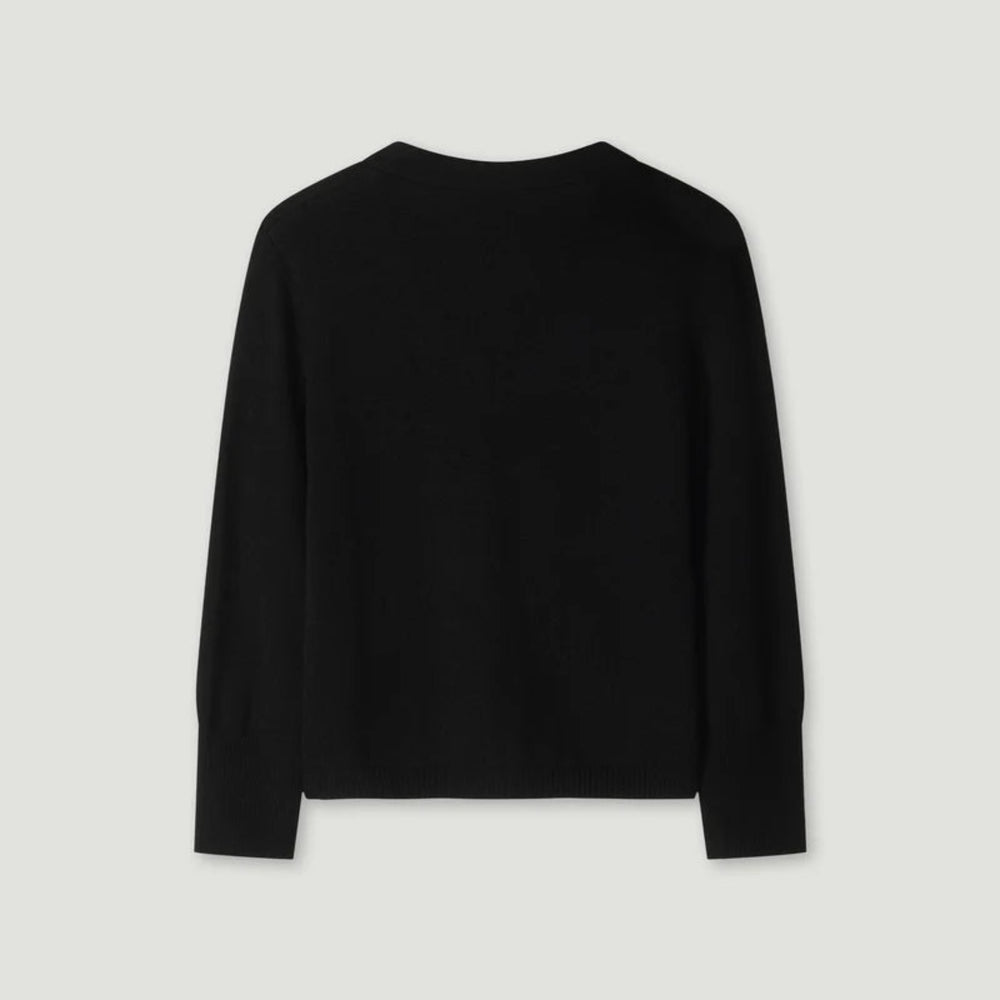 Black long-sleeve shirt on a light gray background