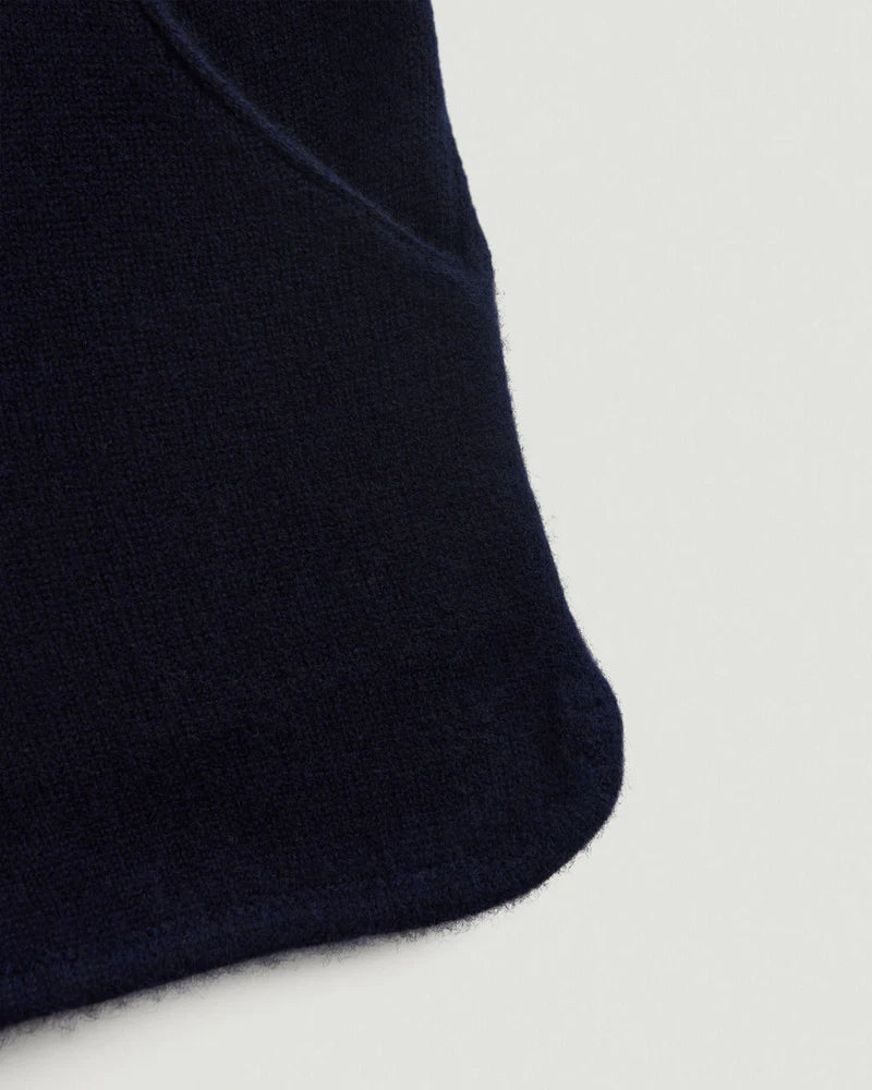 Navy blue fabric on a light gray background