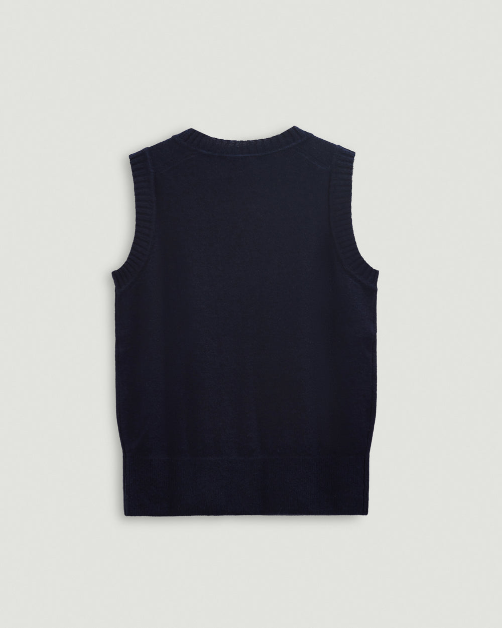 Black sleeveless top on a light gray background