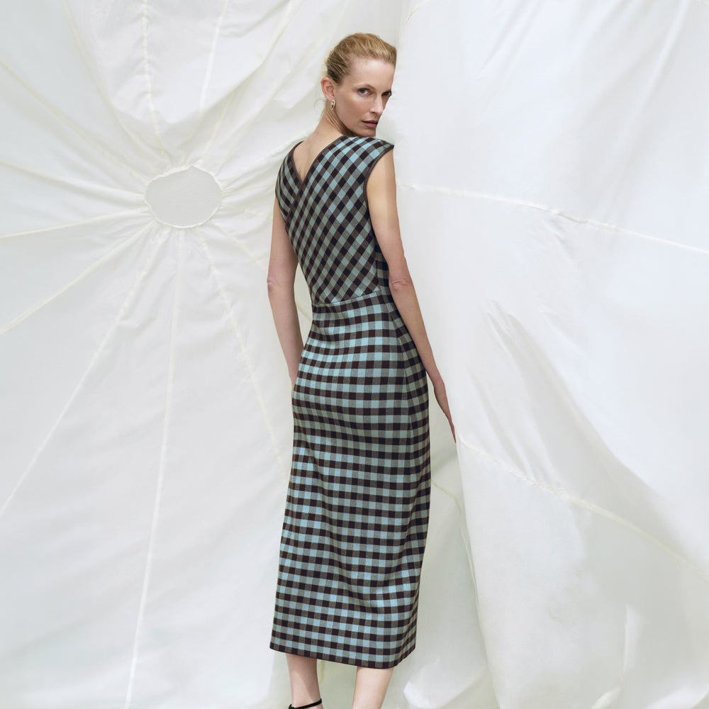 Back image of a woman wearing the Ziggy Dress in Picnic Check