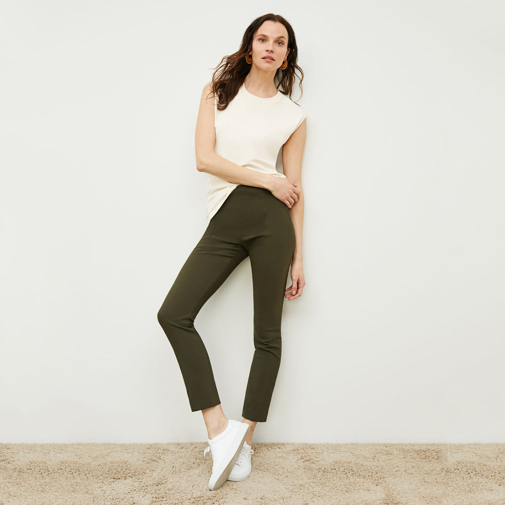 front image of woman wearing foster pant in dark olive