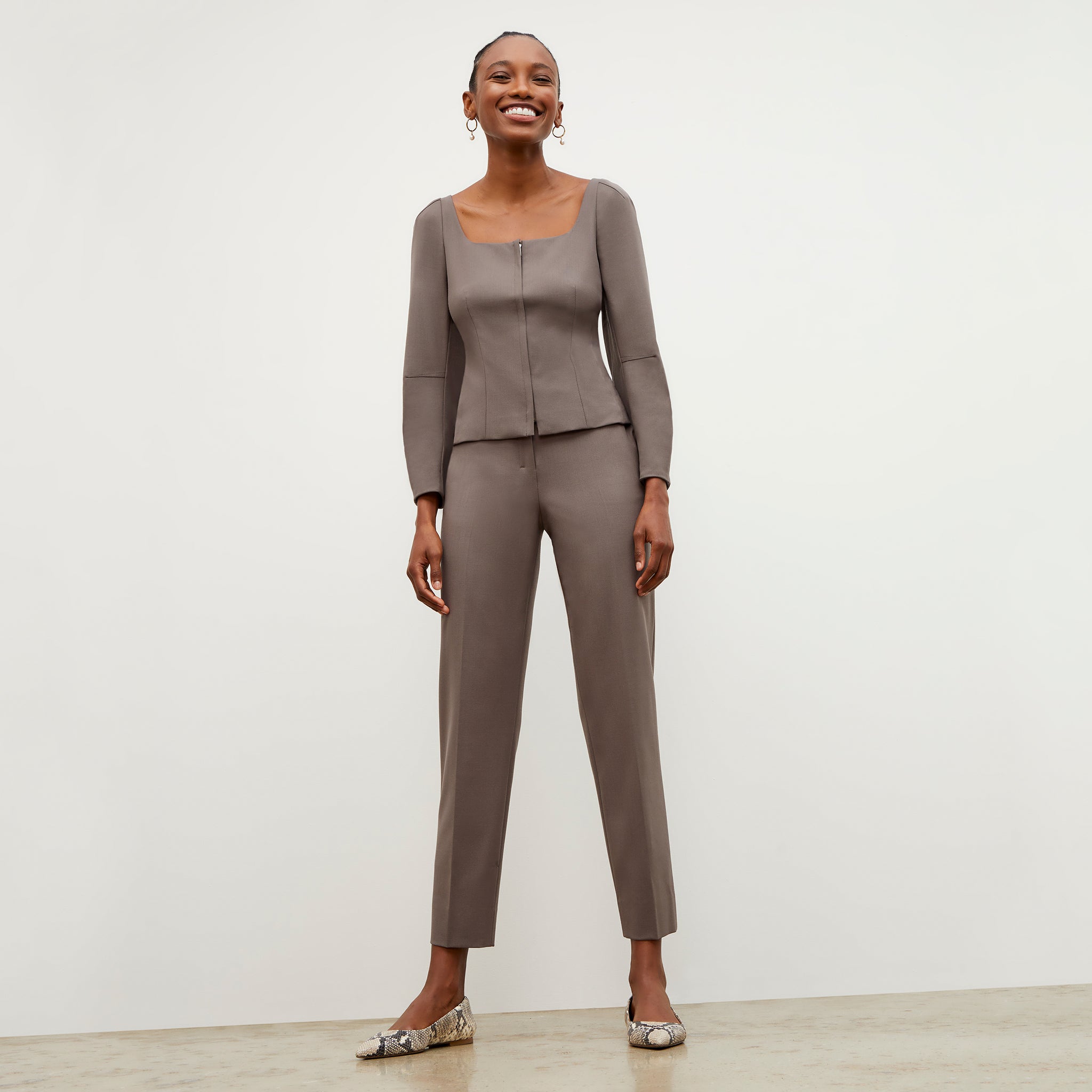 Front image of a woman wearing the Mejia Pant - Sharkskin in Mink 