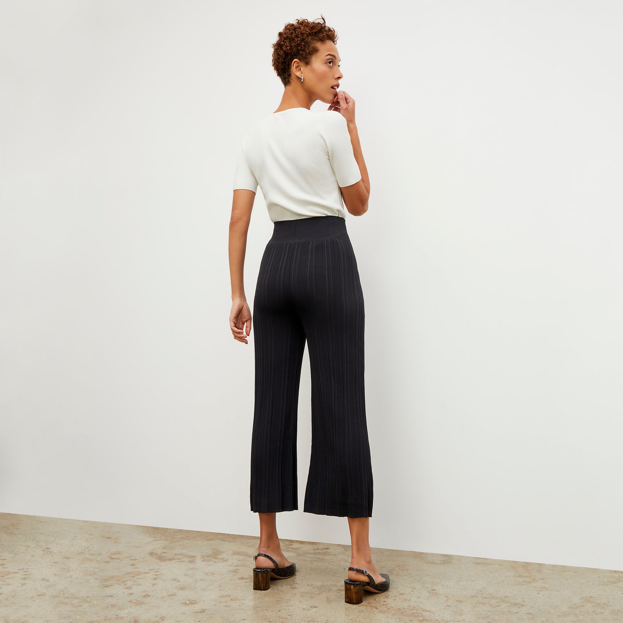 Back image of a woman wearing the Marijane Pant - Textured Knit in Black