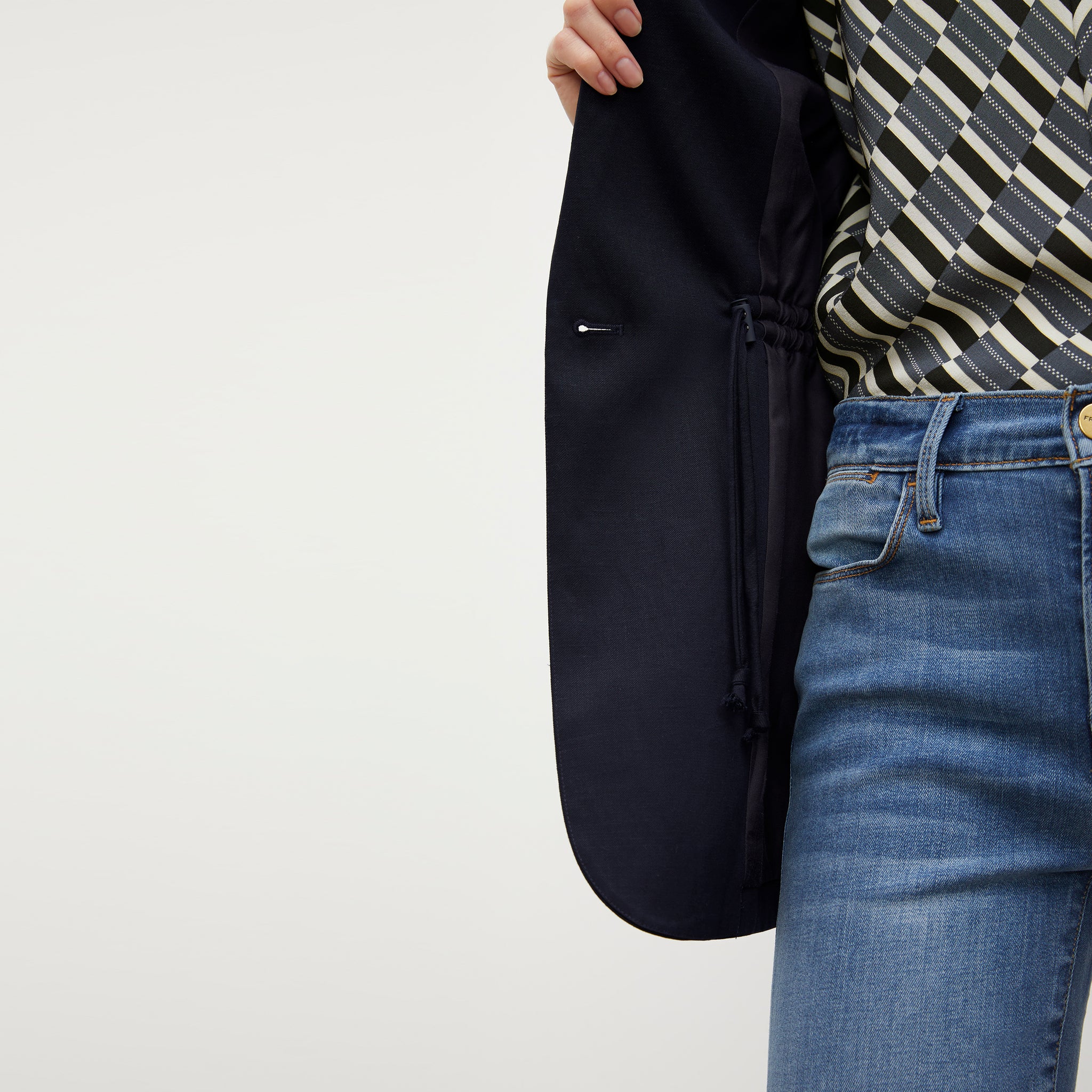 Detail image of a woman wearing the Hyo Jacket - Everyday Twill in Night