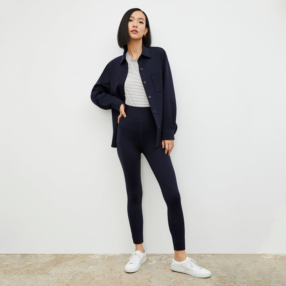 Front image of a woman wearing the Harrington Legging - Light Scuba in Space Blue
