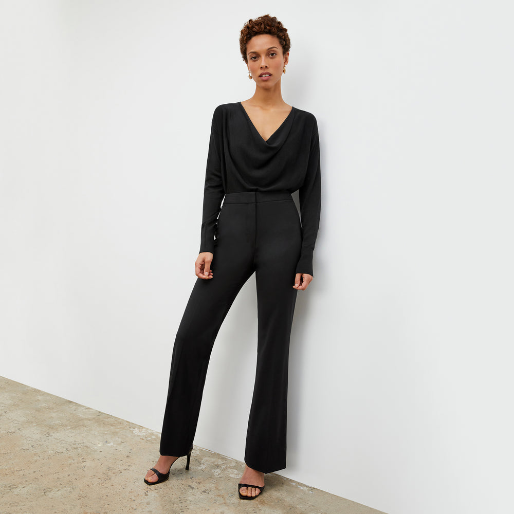 Front image of a woman wearing the Monica Top in Black