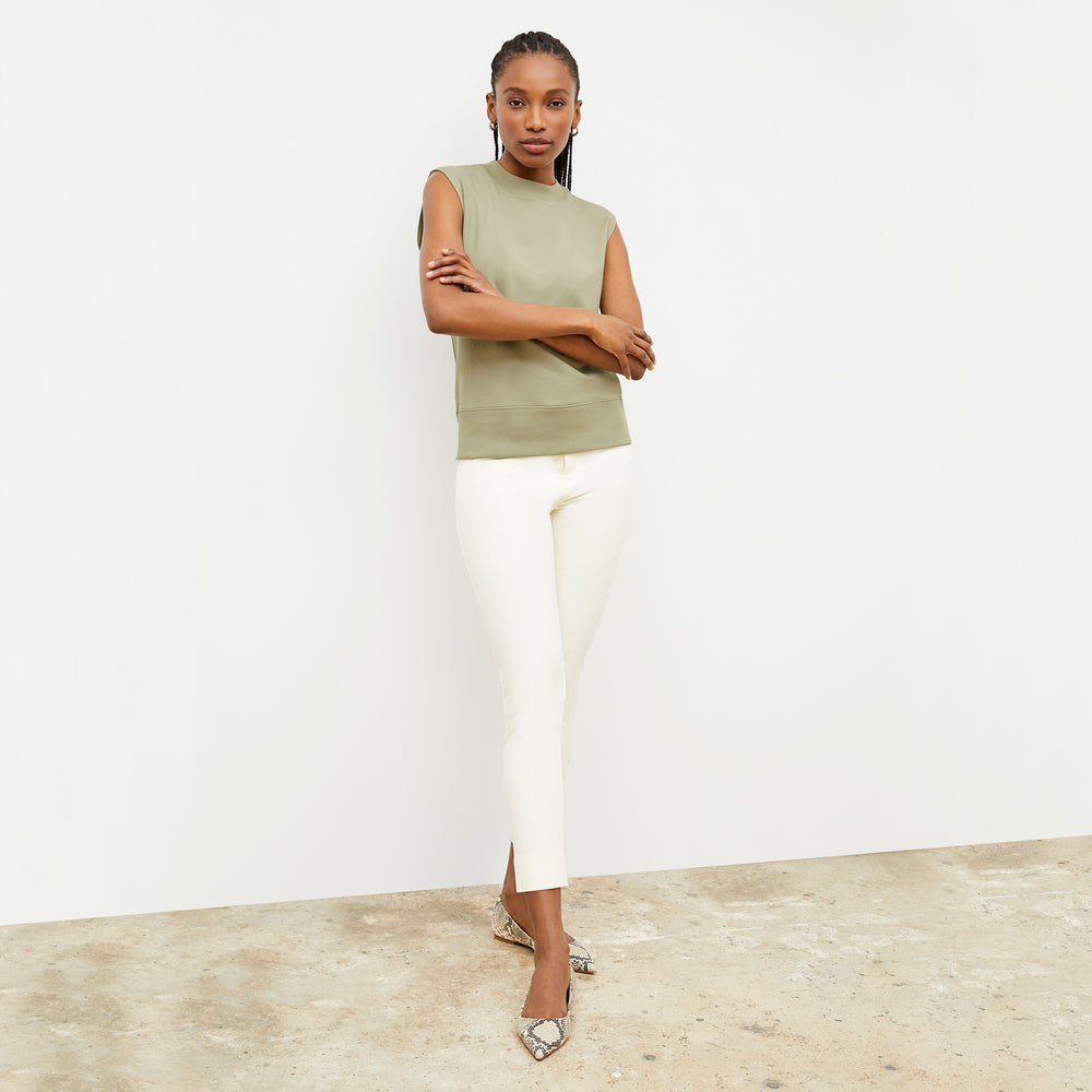 Side image of a woman wearing the Sammataro Jean in Tusk